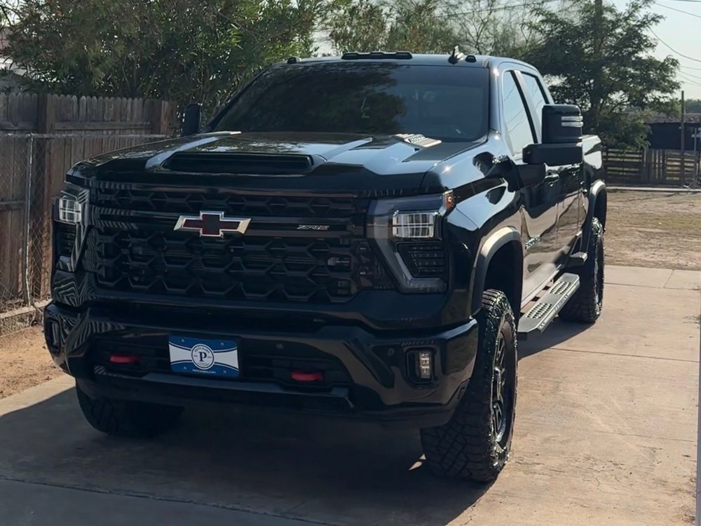 Black Chevrolet Silverado ZR2 detailed inside and out on a driveway